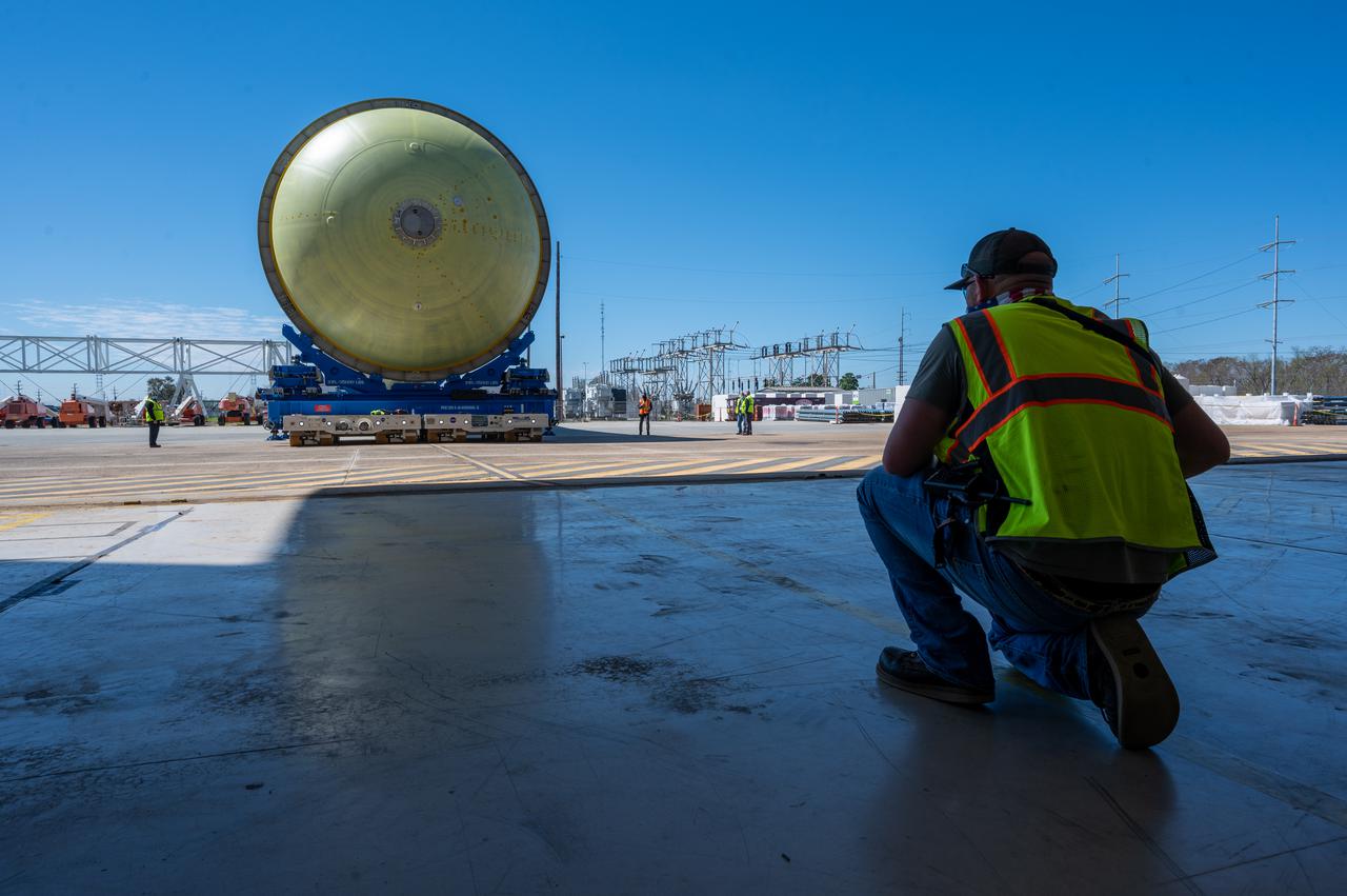 This image highlights the liquid hydrogen tank that will be used on the core stage of NASA’s Space Launch System rocket for Artemis II, the first crewed mission of NASA’s Artemis program. The tank is being built at NASA’s Michoud Assembly Facility in New Orleans. The SLS core stage is made up of five unique elements: the forward skirt, liquid oxygen tank, intertank, liquid hydrogen tank, and the engine section. The liquid hydrogen tank holds 537,000 gallons of liquid hydrogen cooled to minus 423 degrees Fahrenheit and sits between the core stage’s intertank and engine section. The liquid hydrogen hardware, along with the liquid oxygen tank, will provide propellant to the four RS-25 engines at the bottom of the cores stage to produce more than two million pounds of thrust to launch NASA’s Artemis missions to the Moon. Together with its four RS-25 engines, the rocket’s massive 212-foot-tall core stage — the largest stage NASA has ever built — and its twin solid rocket boosters will produce 8.8 million pounds of thrust to send NASA’s Orion spacecraft, astronauts and supplies beyond Earth’s orbit to the Moon and, ultimately, Mars. Offering more payload mass, volume capability and energy to speed missions through space, the SLS rocket, along with NASA’s Gateway in lunar orbit, the human landing system, and Orion spacecraft, is part of NASA’s backbone for deep space exploration and the Artemis lunar program. No other rocket can send astronauts in Orion around the Moon in a single mission.